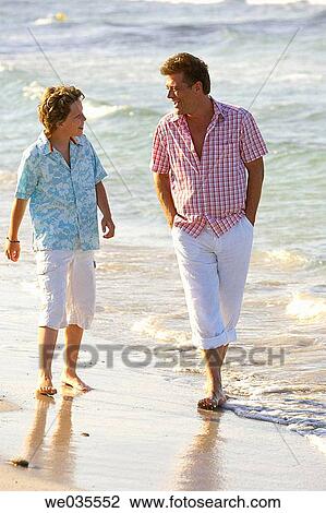 barefoot, beach, boy, calm View Large Photo Image Stock Image - barefoot, beach, boy, calm. Fotosearch
