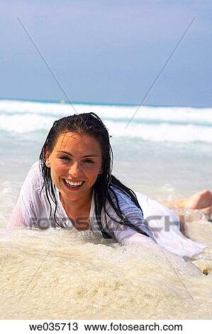 bathe, bathing, beach, brunette View Large Photo Image Stock Image - bathe, bathing, beach, brunette. Fotosearch