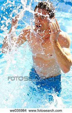 bathe, black hair, bathing-suit, bathing, action View Large Photo Image Picture - bathe, black hair, bathing-suit, bathing, action. Fotosearch
