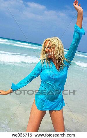 bathe, blond, beach, bathing, Arms raised View Large Photo Image Stock Photography - bathe, blond, beach, bathing, Arms raised. Fotosearch