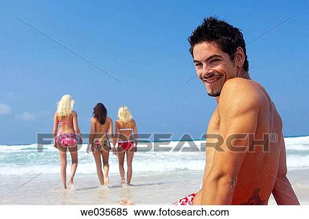 Stock Photography - beach, black hair. Fotosearch