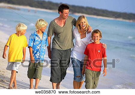 Stock Image - beach, boy, brother, calm. Fotosearch