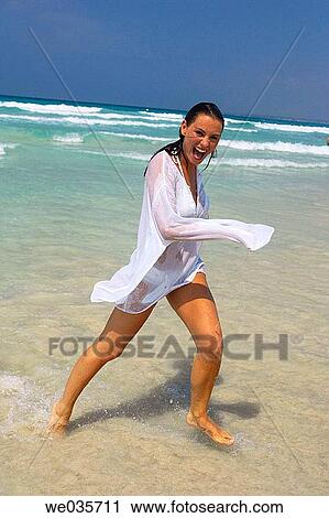 beach, brunette, amusement View Large Photo Image Stock Image - beach, brunette, amusement. Fotosearch