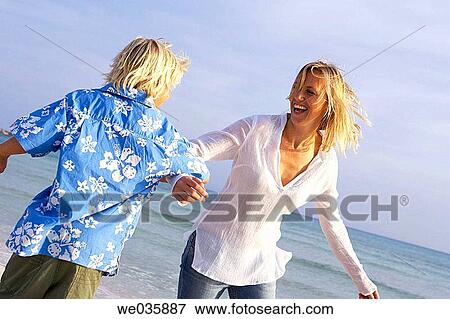 beach, carefree, boy, 30's View Large Photo Image Stock Photo - beach, carefree, boy, 30's. Fotosearch