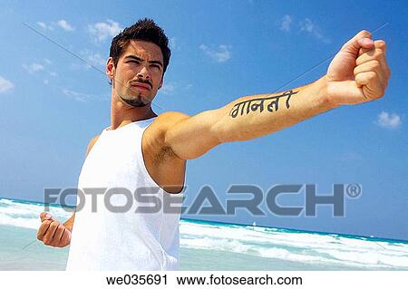 Stock Image - beach, Clenching fist, concentrate. Fotosearch