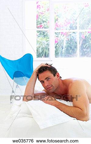 Stock Photograph - bed, black hair, bedroom, at-home. Fotosearch