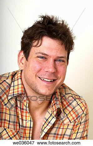 Stock Photo - black hair, blue eyes, contemporary. Fotosearch