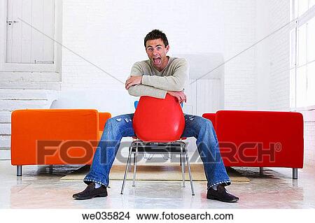 black hair, chair, at-home View Large Photo Image Picture - black hair, chair, at-home. Fotosearch