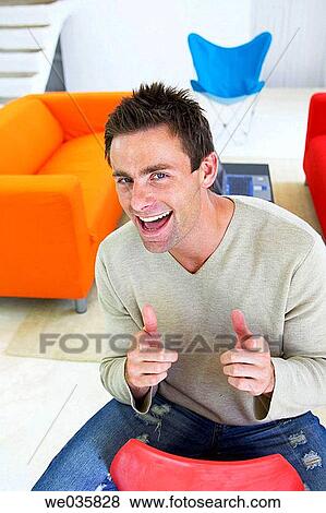 Stock Photo - black hair, chair, at-home. Fotosearch