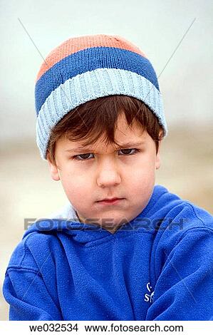 black hair, child, cap, boy, angry View Large Photo Image Picture - black hair, child, cap, boy, angry. Fotosearch