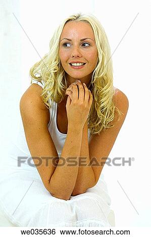 Stock Photograph - blond, absorbed. Fotosearch