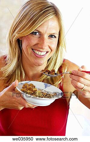 Stock Image - blond, bowl, breakfast, cereals. Fotosearch