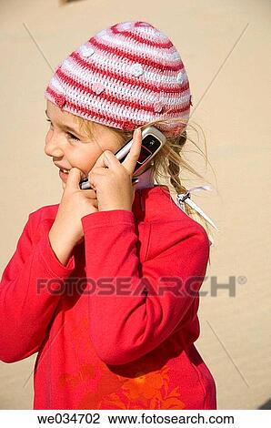 blond, calling, cap, cell phone, child View Large Photo Image Stock Image - blond, calling, cap, cell phone, child. Fotosearch