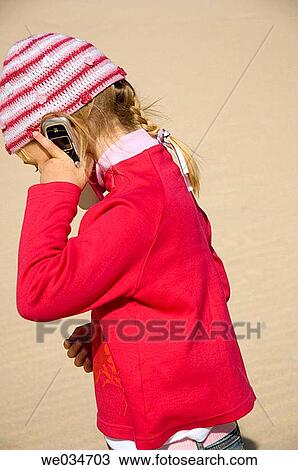blond, calling, cap, cell phone, child View Large Photo Image Stock Image - blond, calling, cap, cell phone, child. Fotosearch