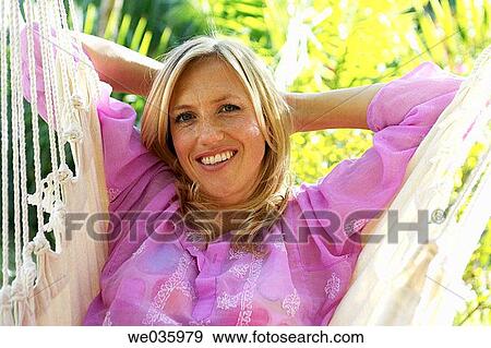 Stock Photo - blond, calm, chilling out. Fotosearch