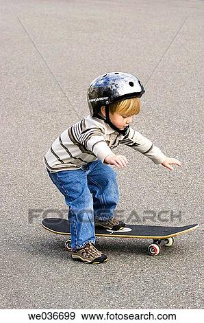 Boy on skateboard View Large Photo Image Stock Photo - Boy on skateboard. Fotosearch