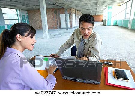 Stock Photo - business, businesswoman, businesspeople, businessman, 30's. Fotosearch