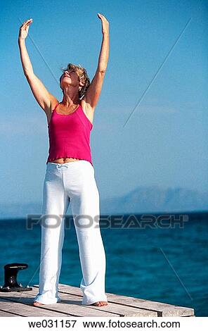 calisthenics, day, contemporary, Arms raised View Large Photo Image Stock Photo - calisthenics, day, contemporary, Arms raised. Fotosearch