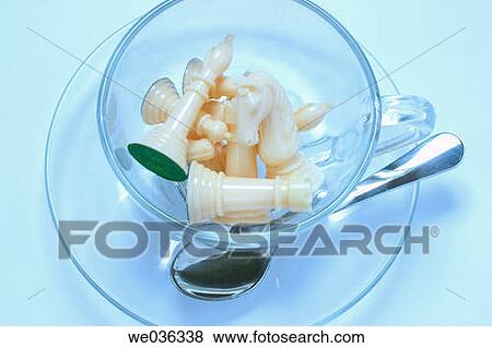 Chess pieces in cup View Large Photo Image Stock Photo - Chess pieces in cup. Fotosearch