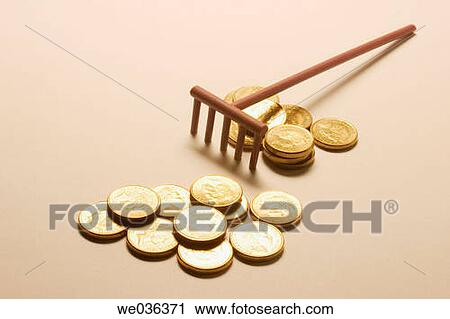 Stock Image - Coins and miniature rack. Fotosearch