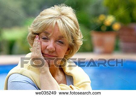 Stock Photo - contemporary, day, absorbed. Fotosearch
