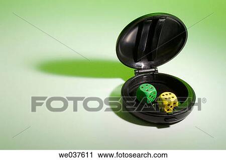 Stock Image - Dice in compact case. Fotosearch