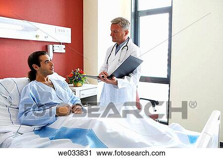 Doctor and patient in hospitalization View Large Photo Image Stock Image - Doctor and patient in hospitalization. Fotosearch