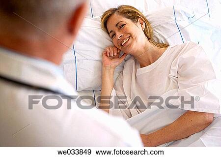 Stock Photo - Doctor and patient in hospitalization. Fotosearch