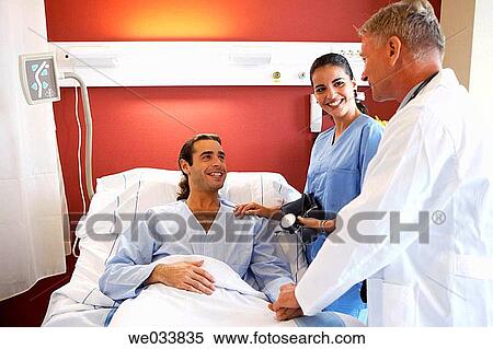Doctors and patient in hospitalization View Large Photo Image Stock Photography - Doctors and patient in hospitalization. Fotosearch