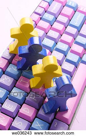 Figures and computer keyboard View Large Photo Image Stock Image - Figures and computer keyboard. Fotosearch