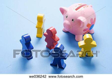 Figures and piggybank View Large Photo Image Stock Image - Figures and piggybank. Fotosearch