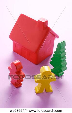 Figures and toy house View Large Photo Image Picture - Figures and toy house. Fotosearch