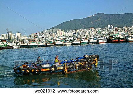 Fishing fleet at Jagalchi Fish Market Wharf. Busan. Republic of Korea. View Large Photo Image Stock Image - Fishing fleet at Jagalchi Fish Market Wharf. Busan. Republic of Korea.. Fotosearch
