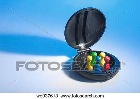 Game pieces in compact case View Large Photo Image Stock Image - Game pieces in compact case. Fotosearch