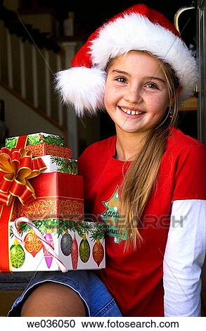 Girl with christmas presents View Large Photo Image Stock Image - Girl with christmas presents. Fotosearch