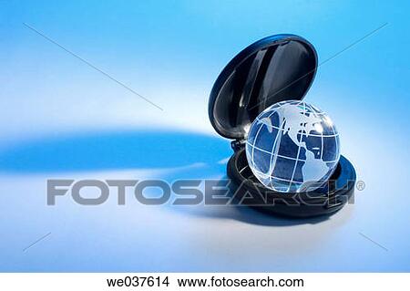Globe in compact case View Large Photo Image Picture - Globe in compact case. Fotosearch