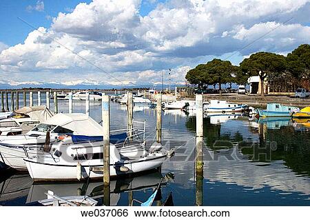 Stock Photograph - Harbour in Grado, Regione Autonoma Friuli Venezia Giulia, Italy. Fotosearch