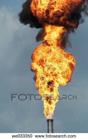 Intense hot fires burning from oil refinery flares. View Large Photo Image Stock Image - Intense hot fires burning from oil refinery flares.. Fotosearch