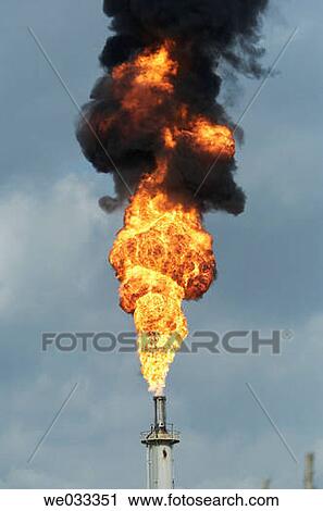 Intense hot fires burning from oil refinery flares. View Large Photo Image Stock Image - Intense hot fires burning from oil refinery flares.. Fotosearch