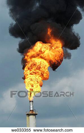 Intense hot fires burning from oil refinery flares. View Large Photo Image Stock Photography - Intense hot fires burning from oil refinery flares.. Fotosearch