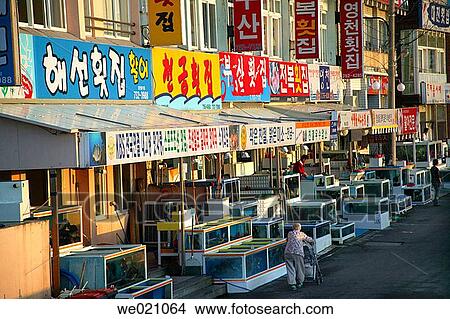 Jeju City, seaside seafood restaurants. Jeju Island. Republic of Korea. View Large Photo Image Picture - Jeju City, seaside seafood restaurants. Jeju Island. Republic of Korea.. Fotosearch