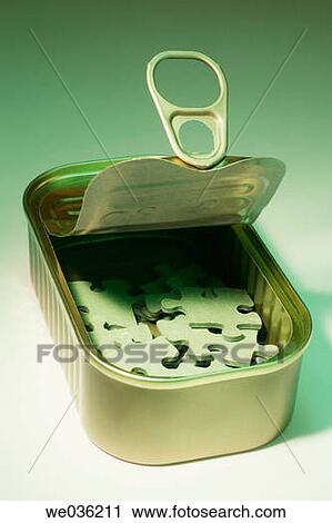 Jigsaw puzzles in tin can View Large Photo Image Stock Image - Jigsaw puzzles in tin can. Fotosearch