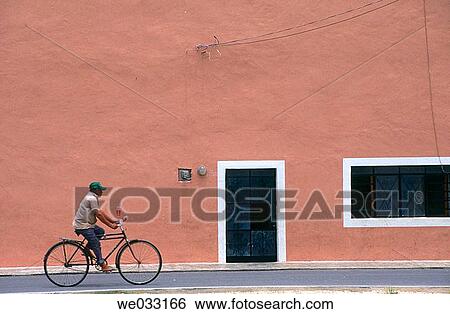 Man riding bicycle. Yucatan, Mexico View Large Photo Image Stock Photograph - Man riding bicycle. Yucatan, Mexico. Fotosearch
