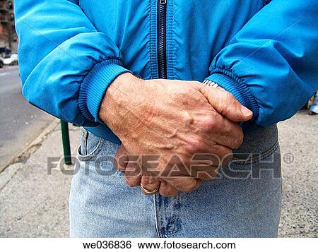 Man with hands folded View Large Photo Image Stock Photograph - Man with hands folded. Fotosearch