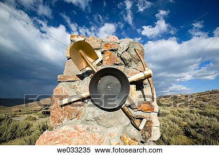 Marker with miner's equipment in ghost town, Bodie State Historic Park. Bodie, California, USA View Large Photo Image Stock Photography - Marker with miner's equipment in ghost town, Bodie State Historic Park. Bodie, California, USA. Fotosearch
