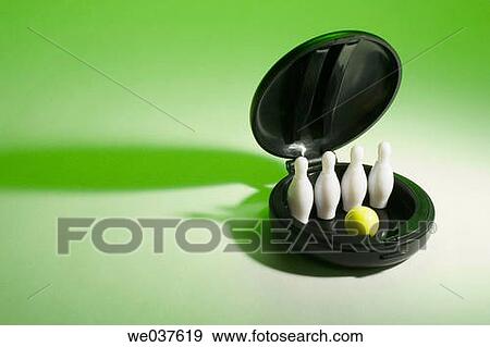 Miniature bowling pins in compact case View Large Photo Image Stock Photo - Miniature bowling pins in compact case. Fotosearch