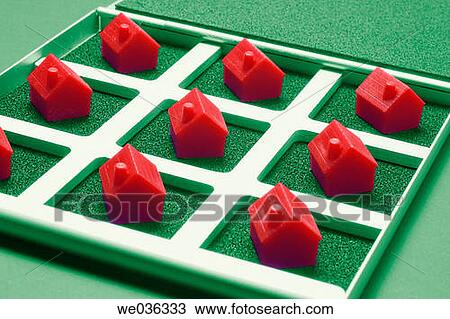 Miniature houses on game board View Large Photo Image Stock Image - Miniature houses on game board. Fotosearch