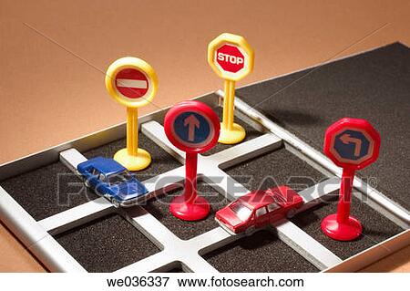 Stock Photo - Miniature traffic scene on game board. Fotosearch