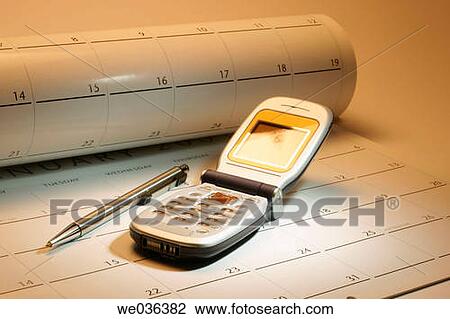 Mobile phone on calendar View Large Photo Image Stock Image - Mobile phone on calendar. Fotosearch