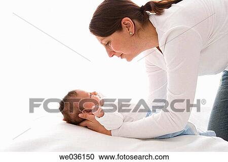 Mother and newborn baby View Large Photo Image Stock Image - Mother and newborn baby. Fotosearch